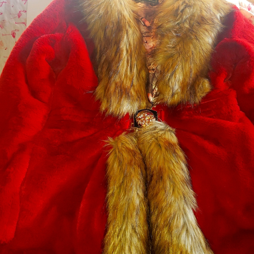 Red fuzzy jacket w fake fur trim and skull clip